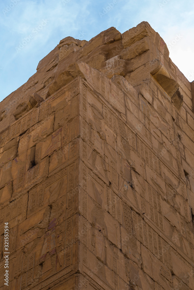 Karnak Temple, complex of Amun-Re. Embossed hieroglyphics on walls. Luxor Governorate, Egypt. Karnak Temple, complex of Amun-Re. Embossed hieroglyphics on walls. Luxor Governorate, Egypt.