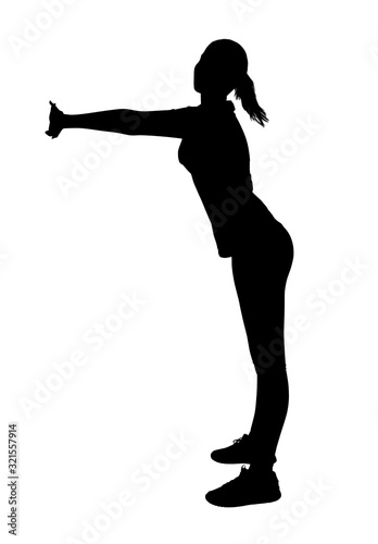 Black silhouette of full length woman doing exercises.