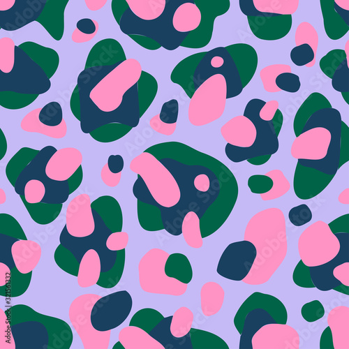 Modern seamless stylized design with jaguar skin in acidic colours. Can be used for printing on paper, stickers, badges, bijouterie, cards, textiles. 