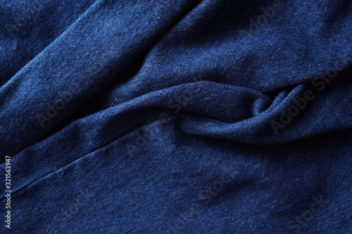 Jeans background. Denim jeans texture. Blue denim pattern.