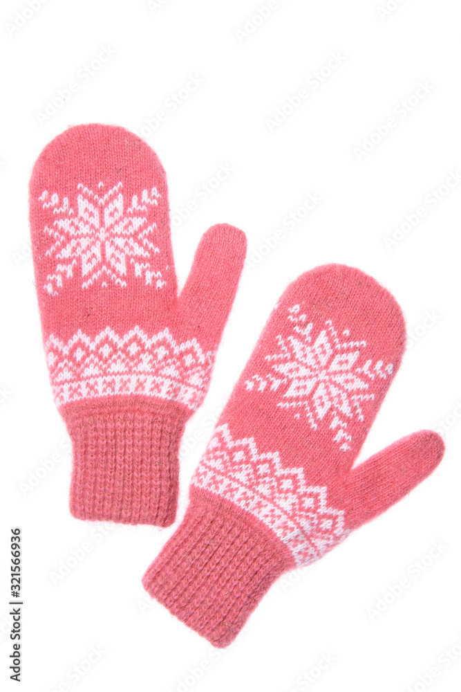 Warm woolen knitted mittens isolated on white background. Pink k Warm woolen knitted mittens isolated on white background. Pink k