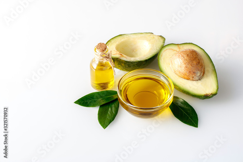 Avocado oil for healthy skin and hair on a white background.
