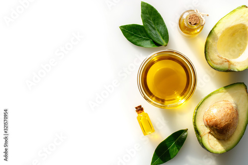 Avocado oil for healthy skin and hair on a white background.