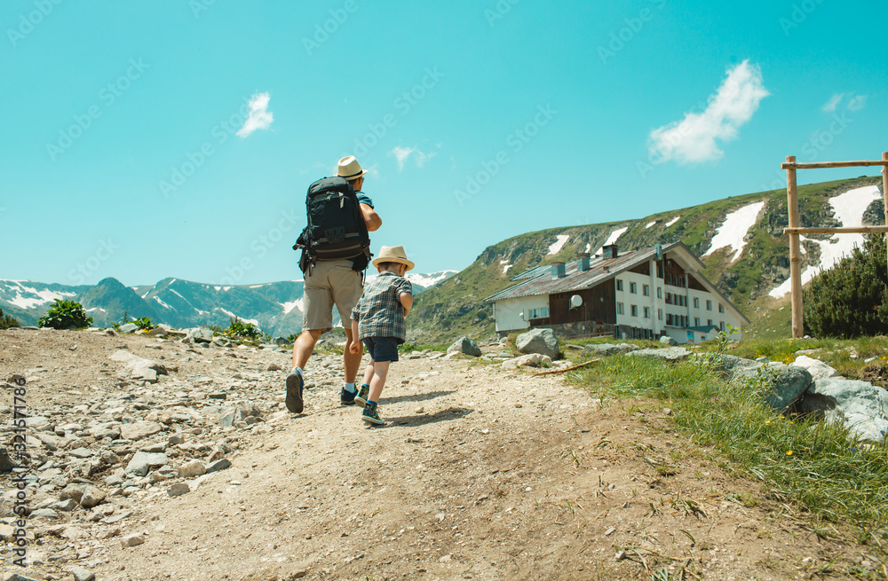 Fototapeta premium Father travels with his three year old son