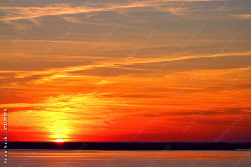 Orange sunset sky over the Estero Bay Aquatic Preserve off of Bonita Springs, Florida
