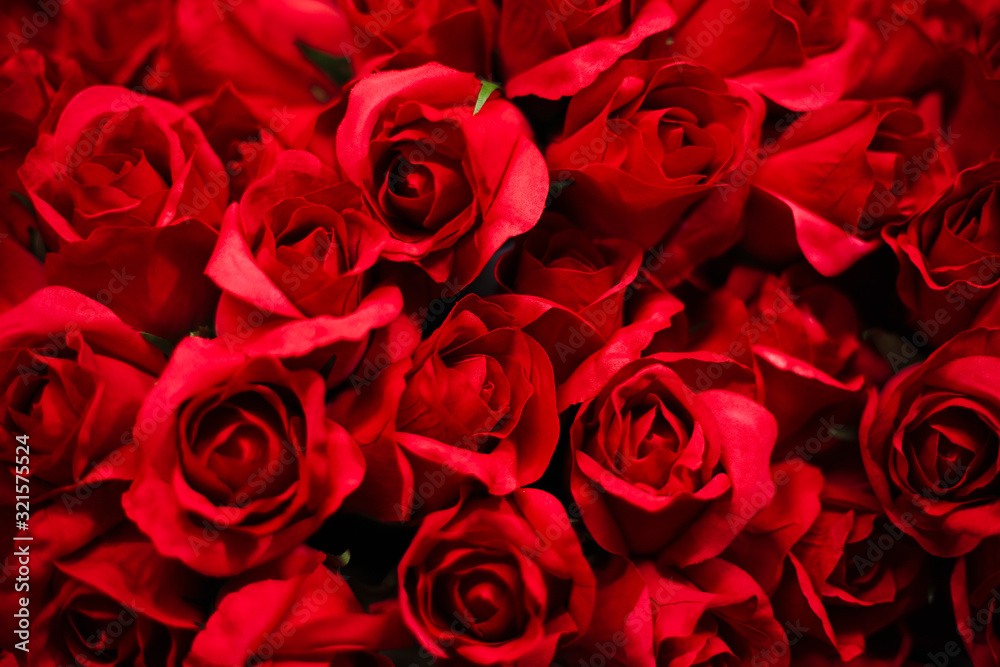 Naklejka premium Bouquet of artificial red roses