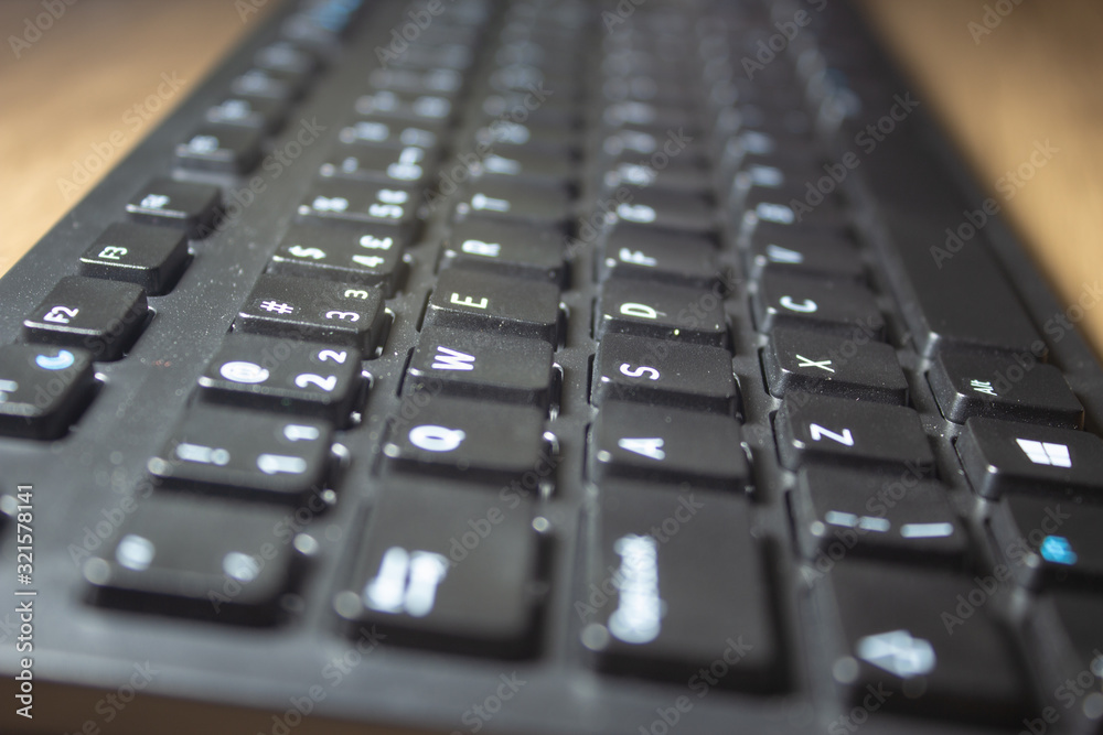 Wireless keyboard computer. Focus on the left side's keys. Wireless keyboard computer. Focus on the left side's keys.
