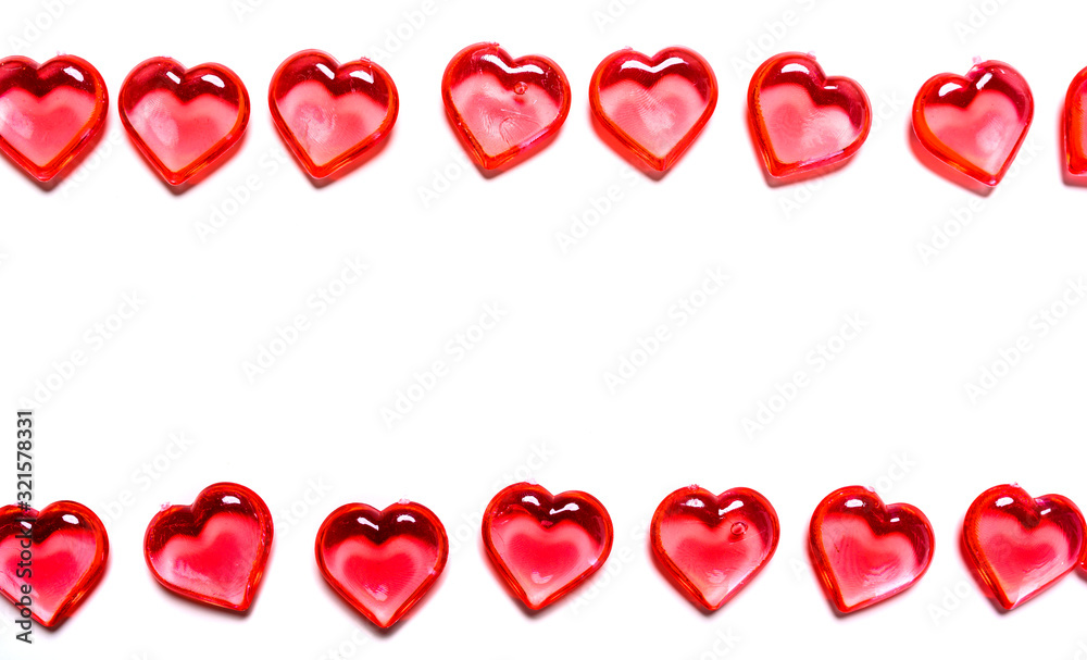 A group of red hearts on a white background with copy space. Valentine's day theme. A group of red hearts on a white background with copy space. Valentine's day theme.