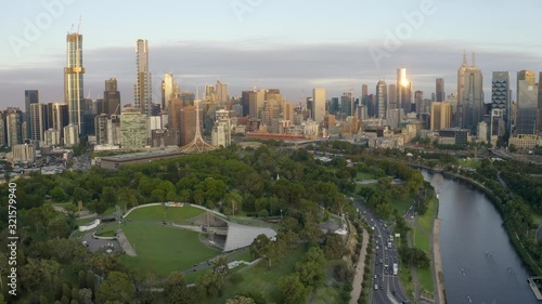 4K aerial footage of the Yarra River heading towards Melbourne CBD at sunrise photo