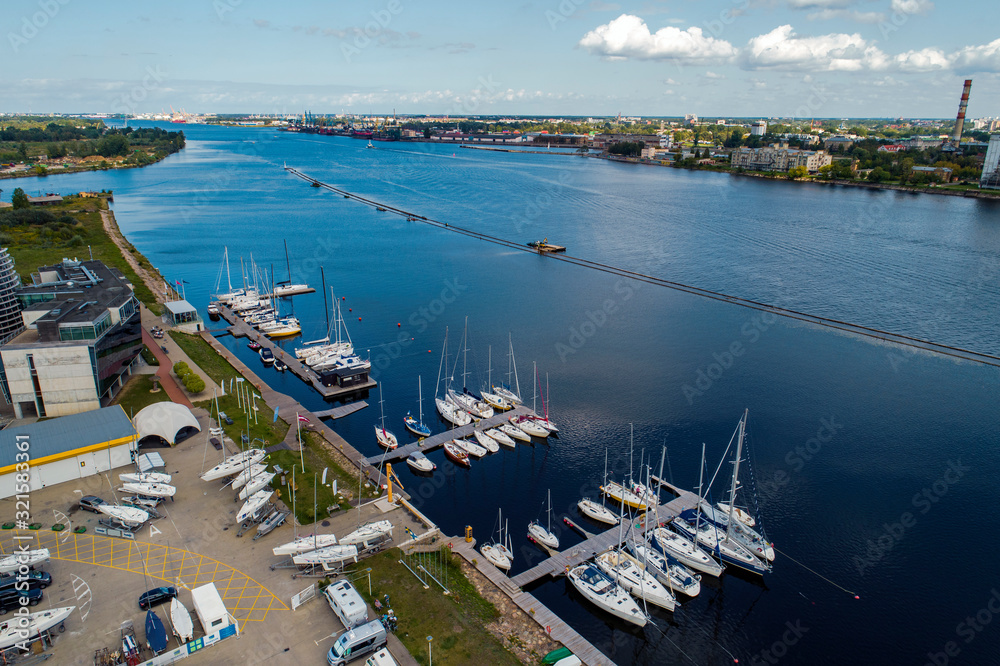 Aerial View of multiple yachts and boats in the dock