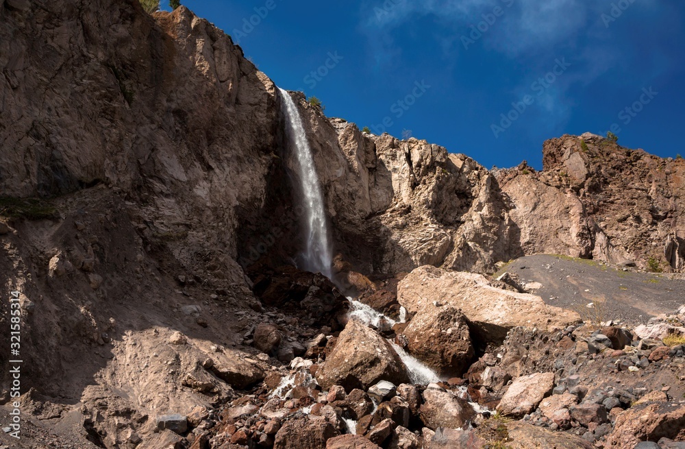 Beautiful falls in the mountain gorge