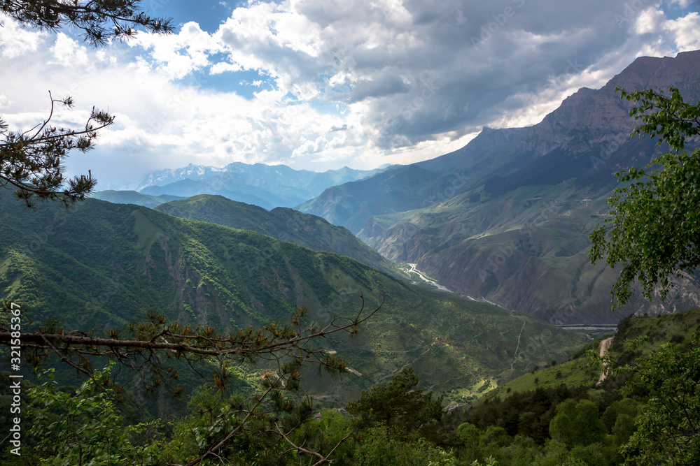 Overcast in mountains. Beautiful mountain rocks in clouds. Landscape of the North Caucasus Overcast in mountains. Beautiful mountain rocks in clouds. Landscape of the North Caucasus