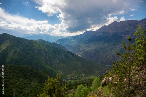 Overcast in mountains. Beautiful mountain rocks in clouds. Landscape of the North Caucasus © Ivan_Gatsenko