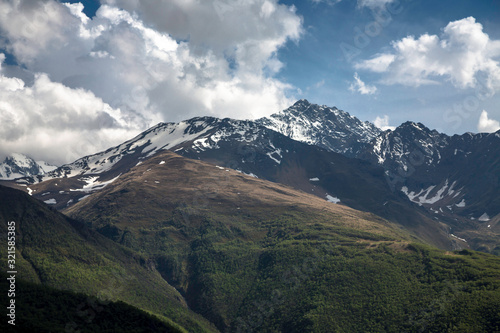 Overcast in mountains. Beautiful mountain rocks in clouds. Landscape of the North Caucasus