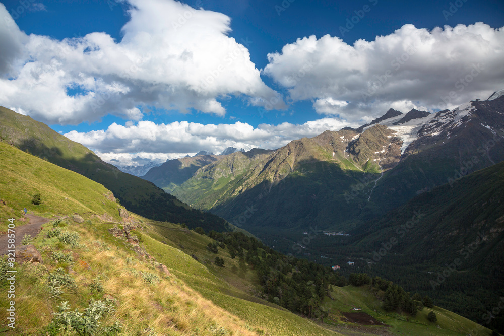 Overcast in mountains. Beautiful mountain rocks in clouds. Landscape of the North Caucasus