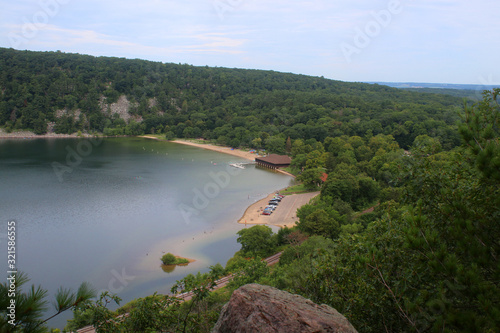 Beautiful Wisconsin summer nature background. Areal view on the North shore beach and lake from East Bluff hiking trail. Devil's Lake State Park, Baraboo area, Wisconsin, Midwest USA.