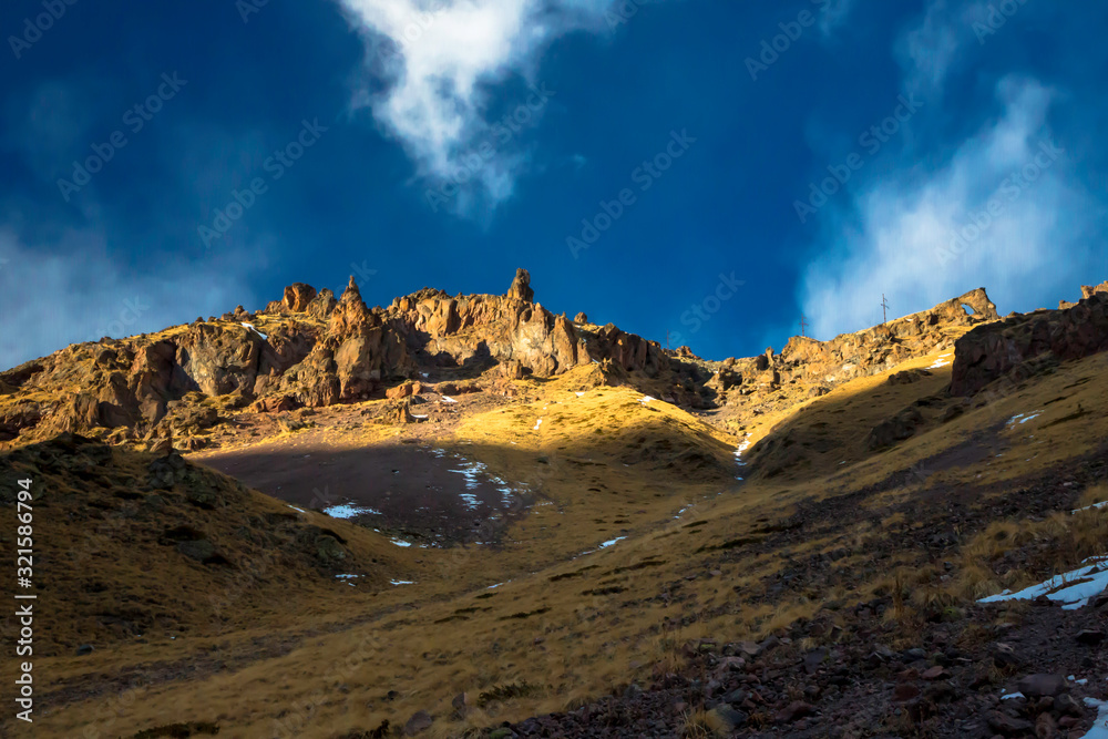 Mountain rocks. The beautiful gorge with high rocks. Nature of the North Caucasus Mountain rocks. The beautiful gorge with high rocks. Nature of the North Caucasus