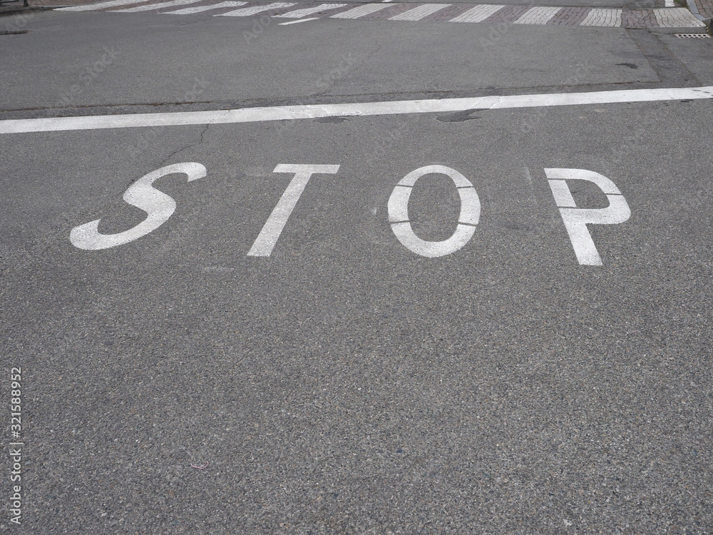 Fototapeta premium stop sign on tarmac