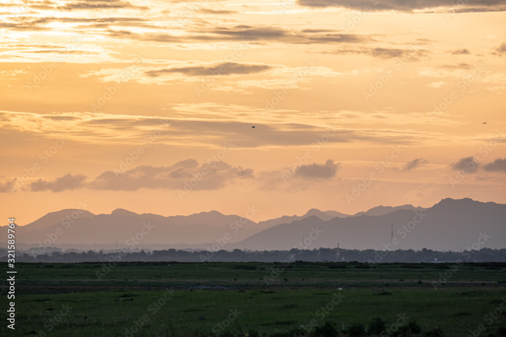 Vast and arid grasslands within the dam in the central region of Thailand Vast and arid grasslands within the dam in the central region of Thailand