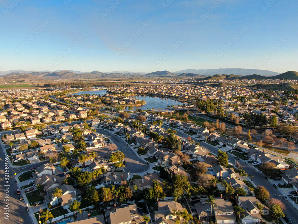 Aerial view of Menifee Lake and neighborhood, residential subdivision vila during sunset. Riverside County, California, United States Aerial view of Menifee Lake and neighborhood, residential subdivision vila during sunset. Riverside County, California, United States