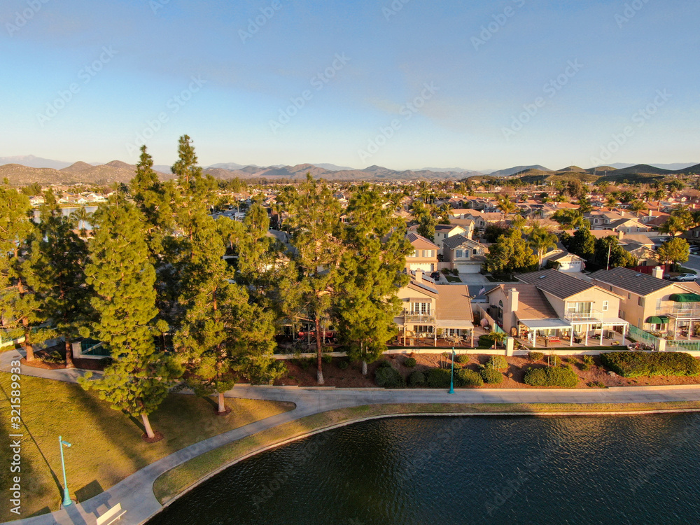 Aerial view of Menifee Lake and neighborhood, residential subdivision vila during sunset. Riverside County, California, United States