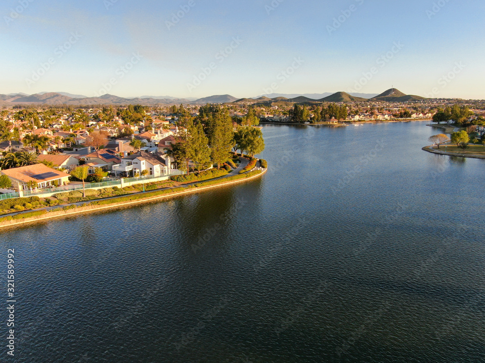 Aerial view of Menifee Lake and neighborhood, residential subdivision vila during sunset. Riverside County, California, United States