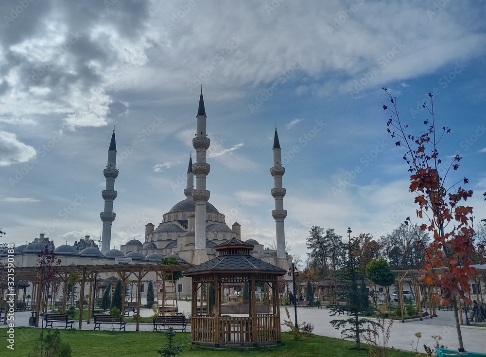 Beautiful new mosque in Bishkek, Kirgistan. Copy of a Turkish istanbul's mosque. Cloudy sky.