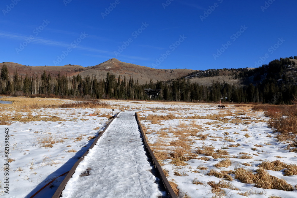 Dusting of snow covers Silver Lake boardwalk in Big Cottonwood Canyon, Utah Dusting of snow covers Silver Lake boardwalk in Big Cottonwood Canyon, Utah