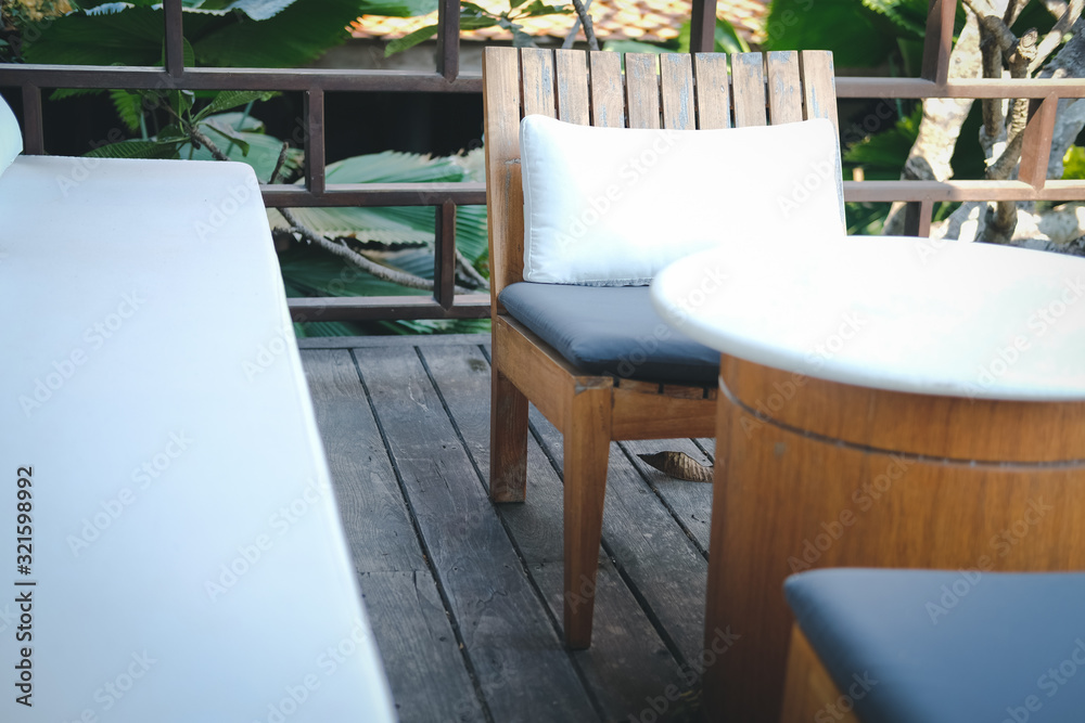 Fototapeta premium wooden chair and sofa couch for relaxing on terrace balcony