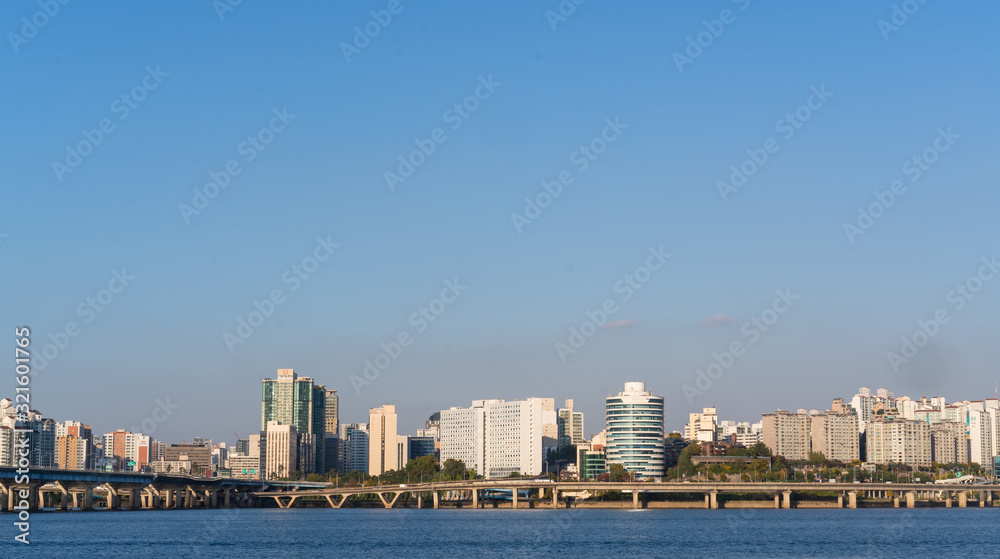 Seoul cityscape, view from Yeouido hangang park and Hangang River, a major tourist attraction in Seoul, South Korea.