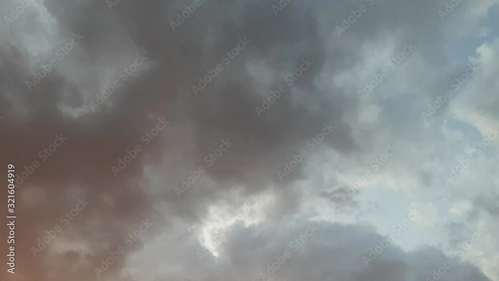 Beautiful late afternoon near dawn golden hour rain clouds moving across the horizon cloudscape time lapse Beautiful late afternoon near dawn golden hour rain clouds moving across the horizon cloudscape time lapse