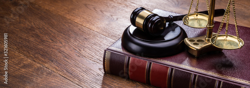 Gavel Near Book With Golden Scale