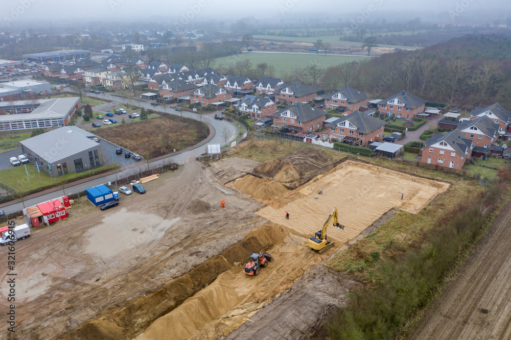  drone image of a large construction site where the floor is being prepared for a factory building