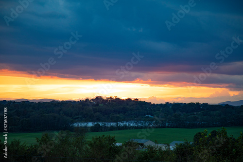 sunset in west virginia countryside with clouds