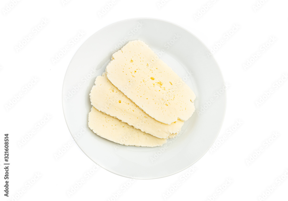 sliced white cheese on a white plate isolated