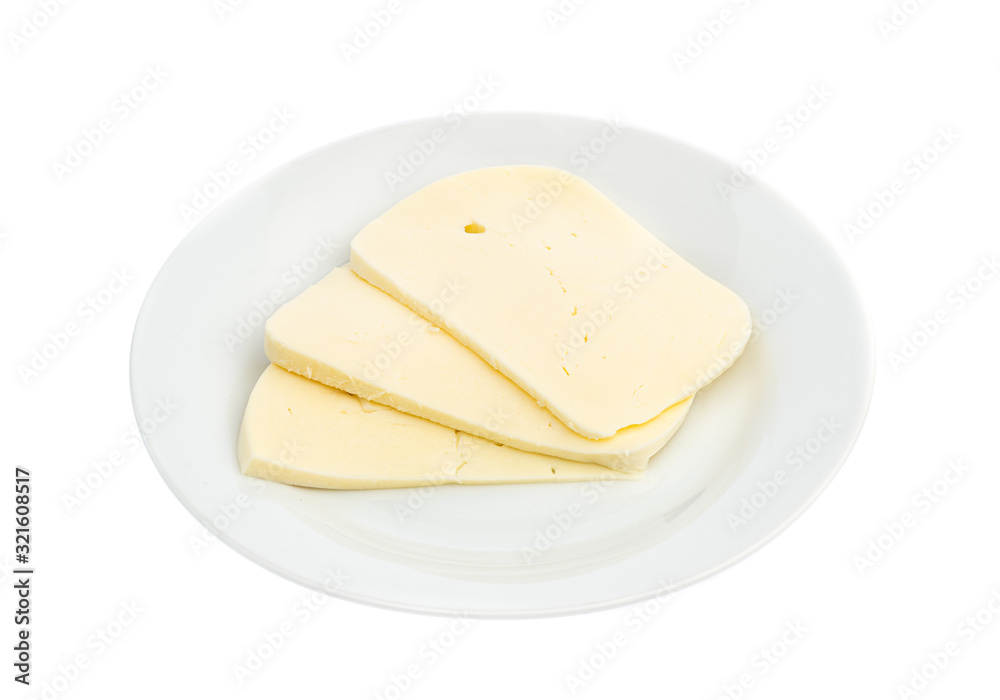 sliced white cheese on a white plate isolated