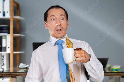 Slika na platnu Man Spilling Coffee On On His Shirt
