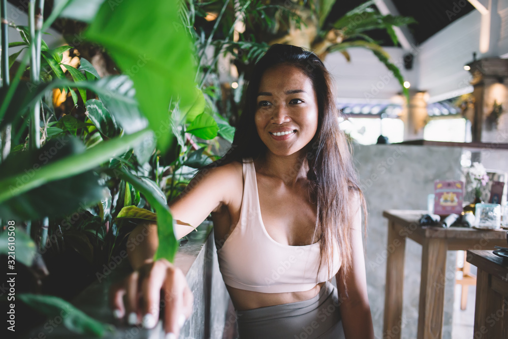 Young woman expecting friend in cafe Young woman expecting friend in cafe