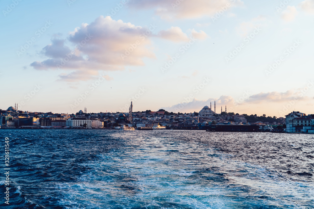 Istanbul old city with Galata promenade from ferry boat. View from Bosphorus water, cityscape with Mosque pics