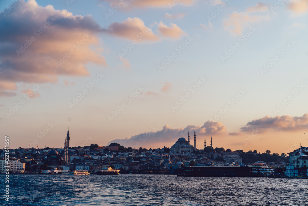 Istanbul old city with Galata promenade from ferry boat. View from Bosphorus water, cityscape with Mosque pics