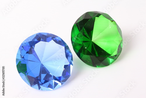 Blue and green diamond on white background