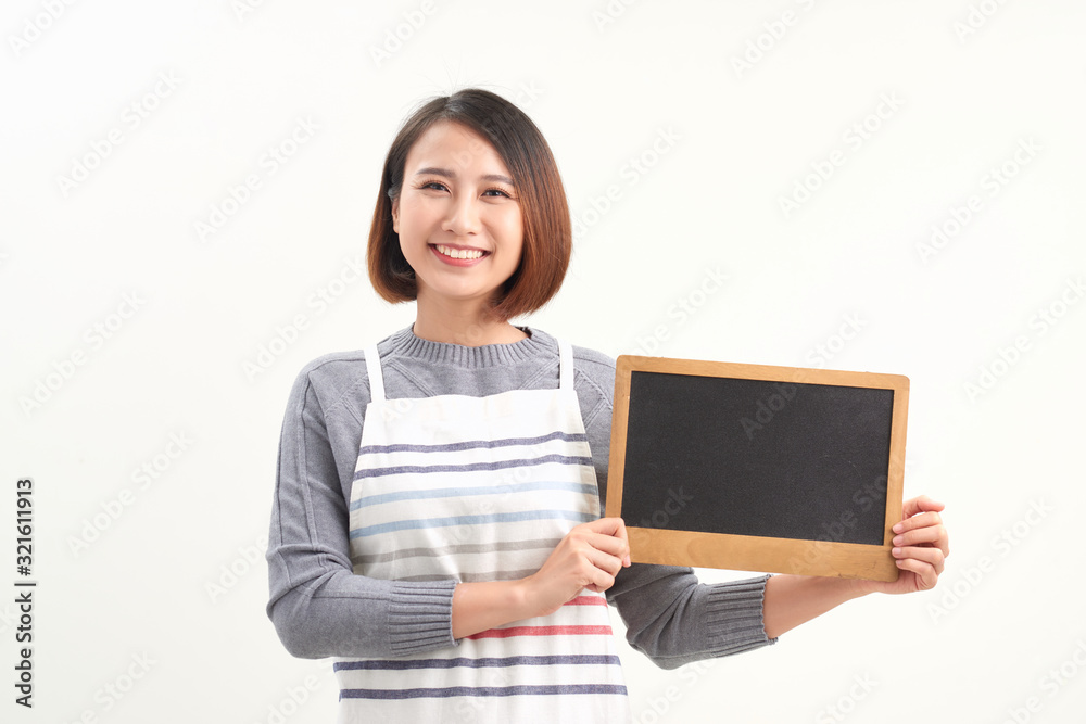 Asian woman wearing apron on white isolated background Asian woman wearing apron on white isolated background