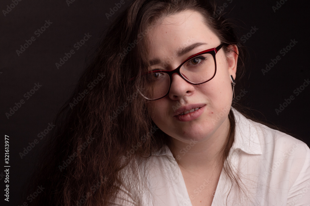 portrait of a plump brunette with long curly hair portrait of a plump brunette with long curly hair