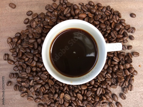 coffee beans on wooden background