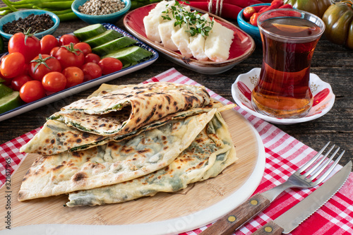 Traditional Turkish food, Turkish pancake gözleme with cheese and herb photo