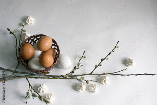 Happy Easter on a white background. Easter decor. Flat lay. Top view.