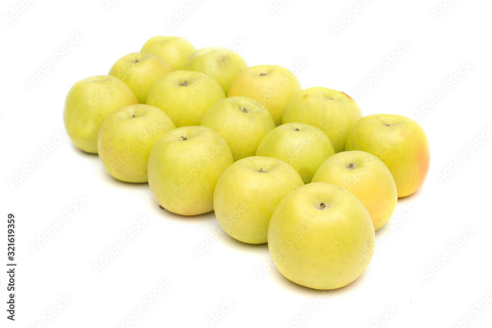 group of yellow apples on a white background, live vitamins, natural iron in fruits group of yellow apples on a white background, live vitamins, natural iron in fruits