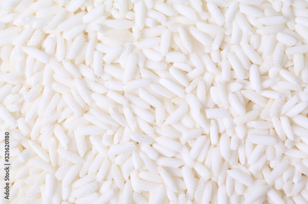 Uncooked white rice background Uncooked white rice background