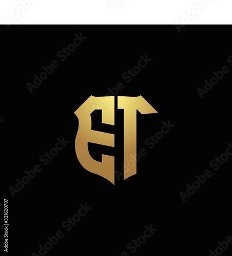 ET logo monogram with gold colors and shield shape design template