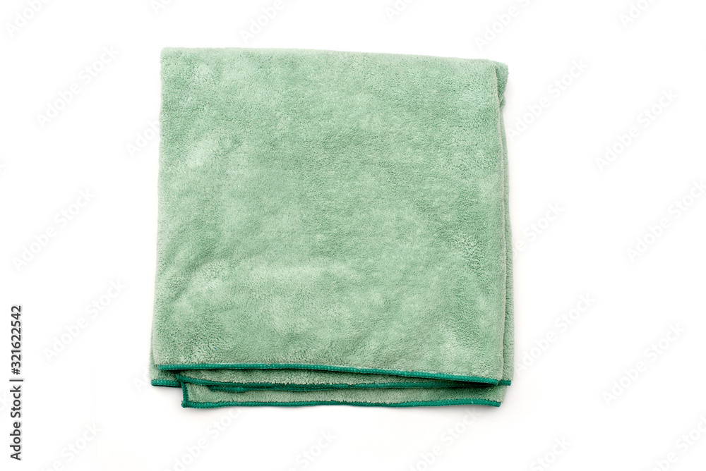 terry towel used after taking a shower or in a spa on a white background terry towel used after taking a shower or in a spa on a white background
